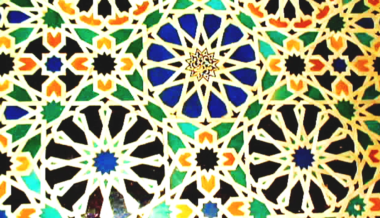 Geometric mosaic pattern at the Alhambra in Granada, Spain.