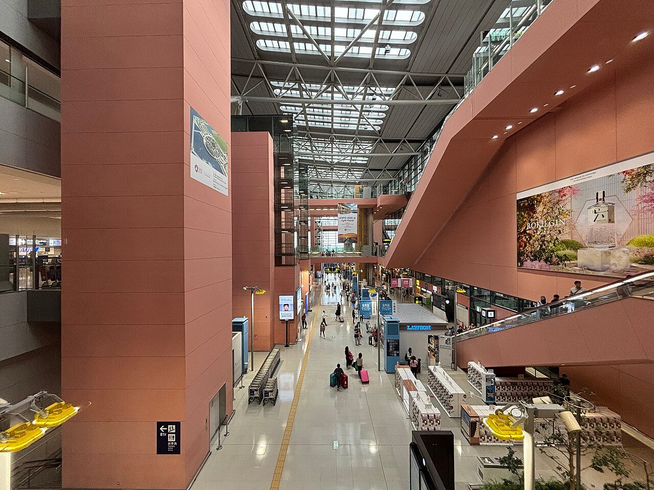 Interior of Kansai International Airport Terminal 1 showing the atrium and sweeping roof structure designed by Renzo Piano